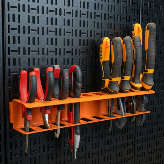 Set of tools including pliers and screwdrivers on an orange holder against a black pegboard background.