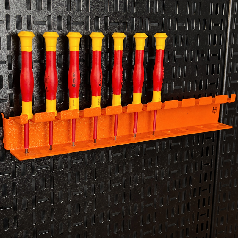 Load image into Gallery viewer, Set of screwdrivers with red and yellow handles on an orange holder against a black textured wall.
