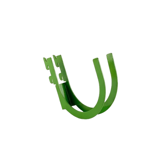 Green metal clip on a white background