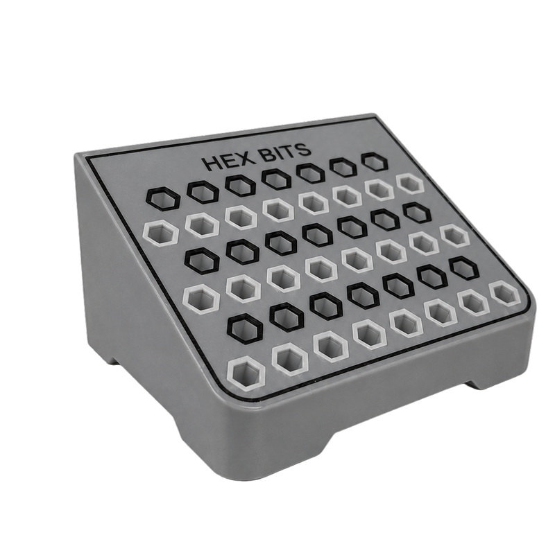 Load image into Gallery viewer, Gray container with hexagonal holes labeled 'HEX BITS' on a black background
