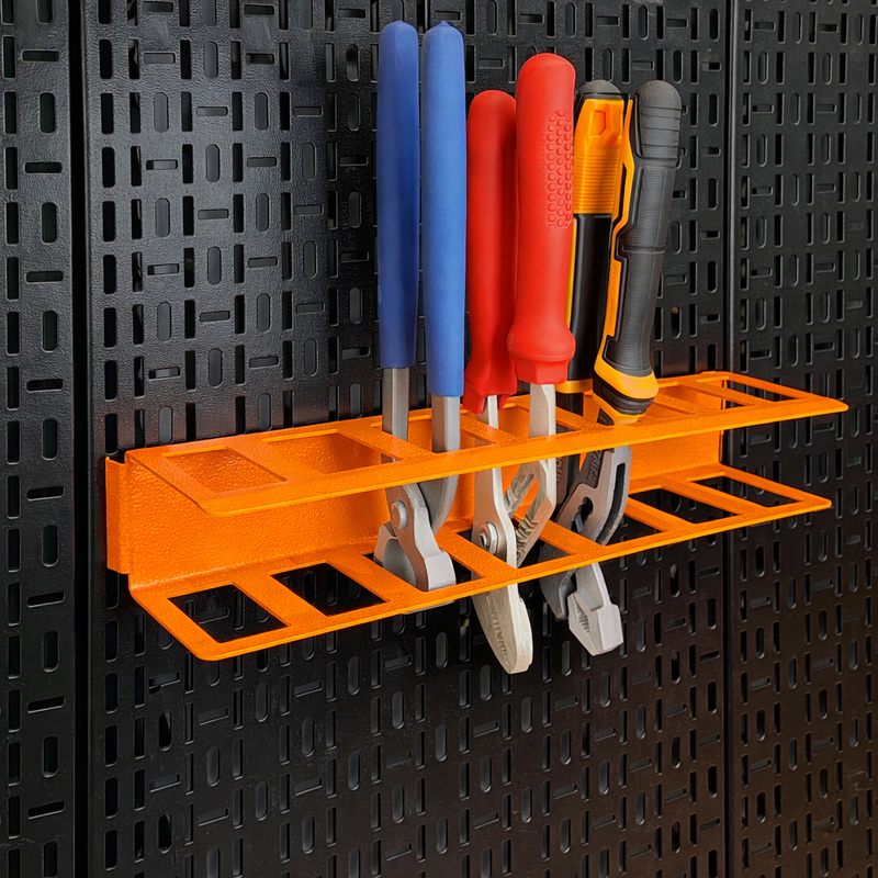 Load image into Gallery viewer, Orange tool holder with various tools on a black pegboard background
