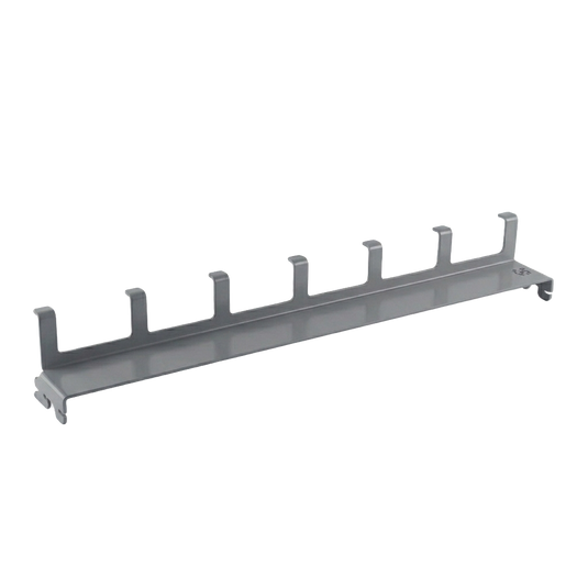 Gray metal pegboard with multiple hooks on a white background