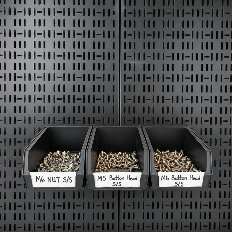 Load image into Gallery viewer, storage bins mounted on a pegboard
