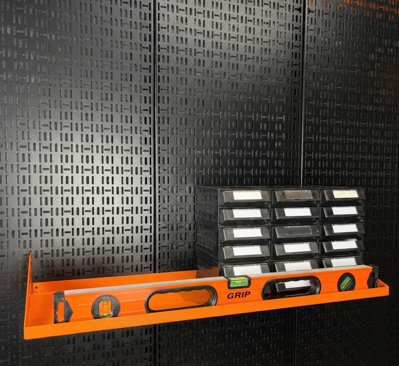 Load image into Gallery viewer, orange shelf on a black pegboard with tools
