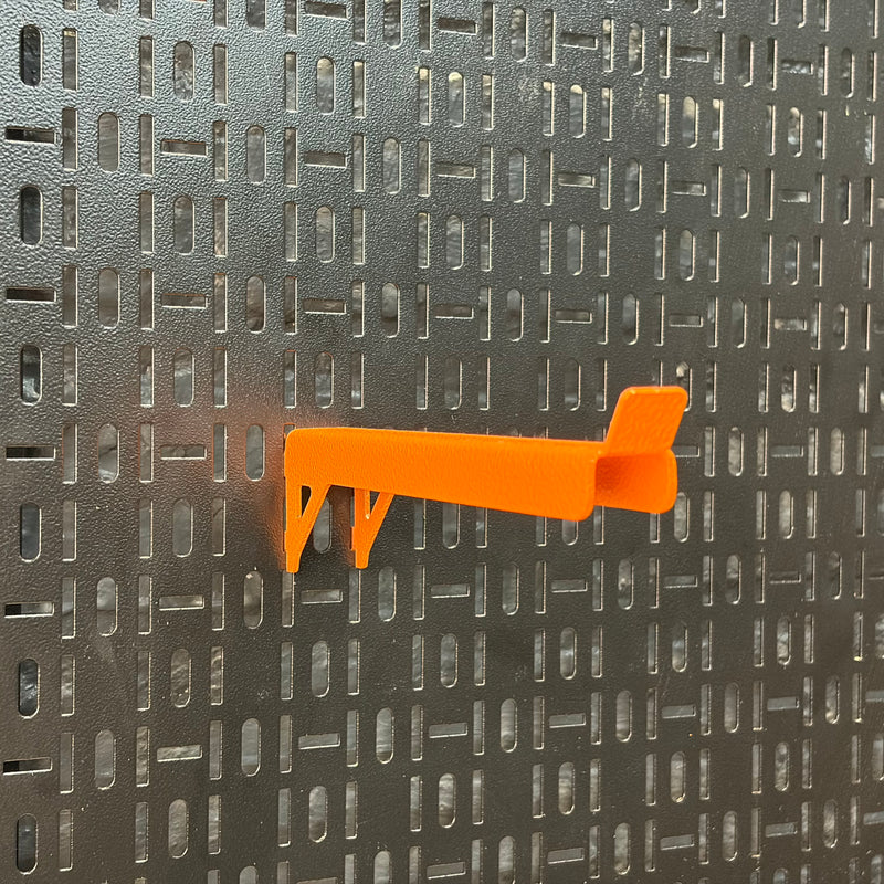 Load image into Gallery viewer, Orange airplane model on a textured gray background
